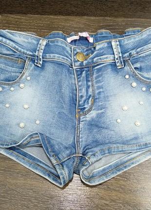 Шикарні джинсові шорти на дівчинку1 фото