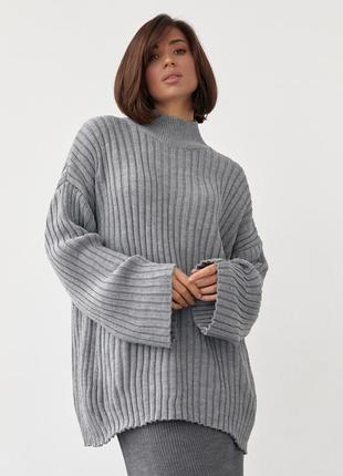 Укорочений светр із цільнокроєними рукавами1 фото