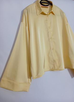 Сатінова жовта блуза з широкими рукавами3 фото