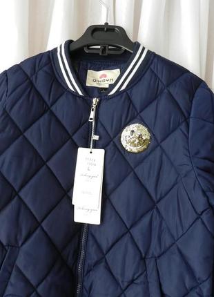 Стеганий дутий бомбер з паєтками та гумками лампасами , маломерит , в наявності...