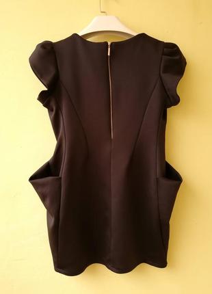 Черное платье из неопрена с объемными карманами италия мини коктейльное7 фото