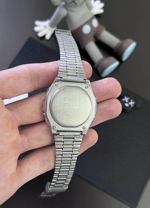 Наручний годинник casio a1000 срібні / нові3 фото