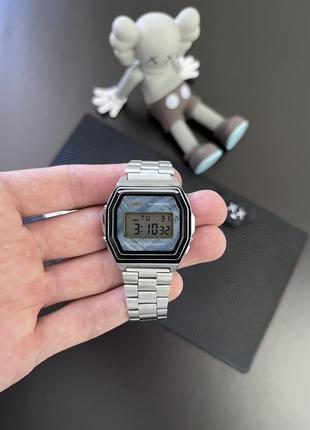 Наручний годинник casio a1000 срібні / нові2 фото