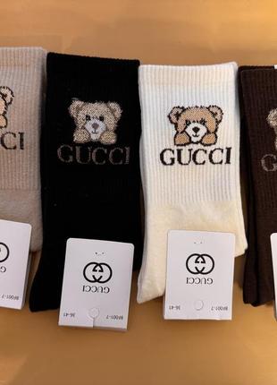 Шкарпетки з логотипом бренду gucci