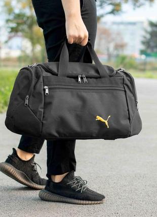 Спортивна сумка дорожня puma tales жовта чорна для поїздок та тренувань на 36 літри1 фото