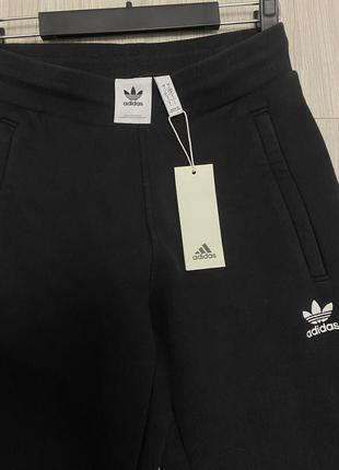 Новые оригинальные штаны adidas на флисе22 года2 фото