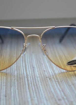 Сонцезахисні окуляри з ультрафіолетовим захистом uv 4004 фото