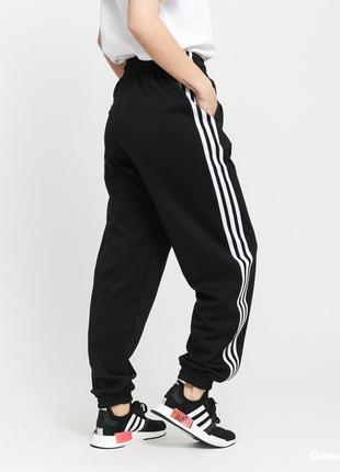 Женские спортивные штаны adidas originals adicolor 3d trefoil2 фото