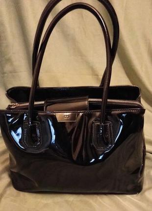 Містка лакова сумка debenhams