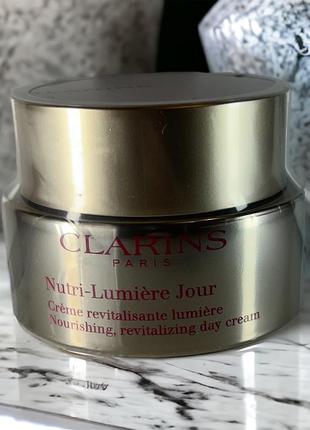 Clarins nutri-lumière day восстанавливающий дневной крем для сияющего вида кожи 50 мл1 фото