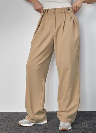 Классические брюки с акцентными пуговицами на поясе3 фото