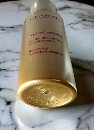 Clarins nutri-lumiere renewing treatment essence восстанавливающий лосьон для лица 10 мл