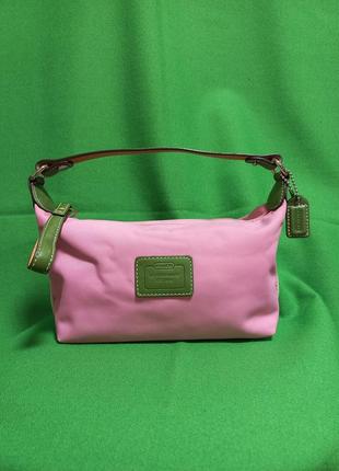 Розовая мини сумка косметичка с отделкой из зелёной кожи coach