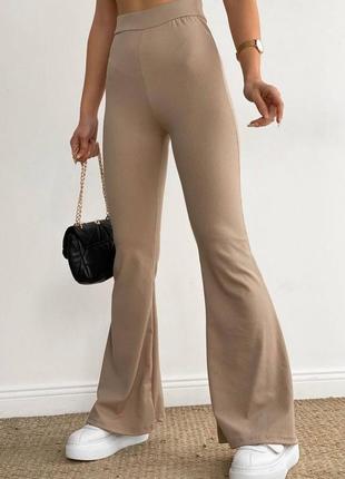 Стильні жіночі брюки кльош в рубчик