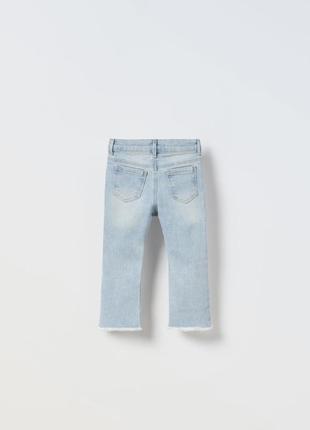 Розкльошені джинси з бахромою zara 98 розмір (2-3 роки)2 фото