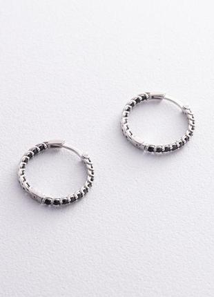 Серебряные серьги - кольца с черными фианитами 
or1261103 фото