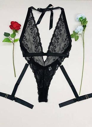 Сексуальне жіноче боді з гартерами чорне