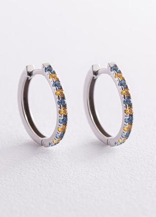 Серебряные серьги - кольца (голубые и желтые 
камни) 698