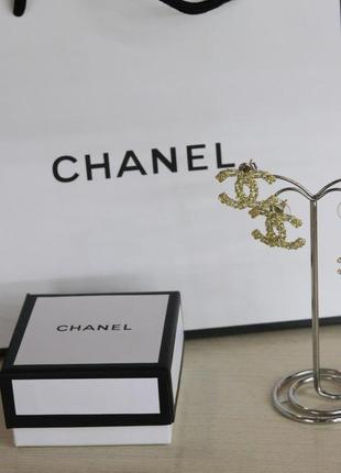 Сережки гвоздики з логотипом/посріблення та позолота 24к4 фото