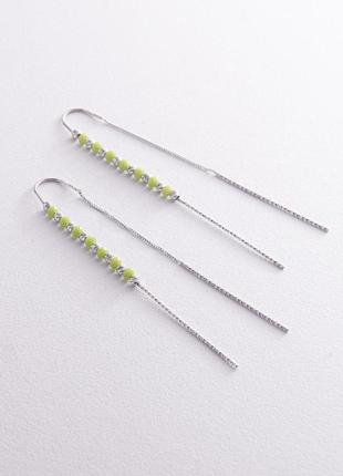 Серебряные серьги - протяжки с зелеными 
камнями 123292