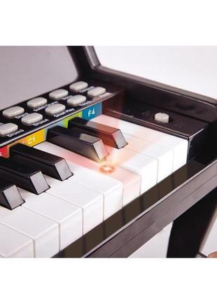 Детское пианино hape 25 клавиш с подсветкой черный (e0627)5 фото