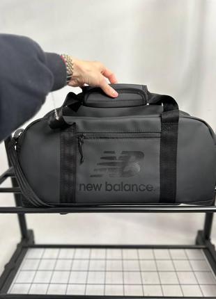Спортивна сумка жіноча / чоловіча сіра (графітова) / чорна з еко-шкіри new balance