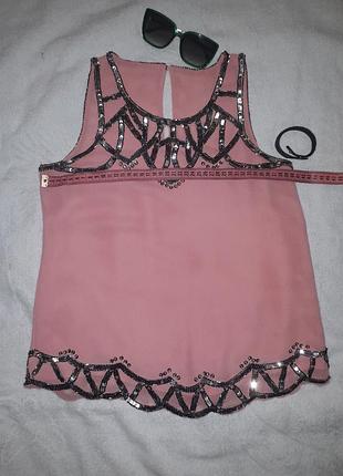 Брендовий нарядна блузка з паєтками.3 фото