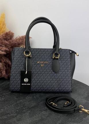 Стильная женская сумка michael kors  темно синего цвета на плече, отлично подойдет под деловой стиль бренда корс8 фото