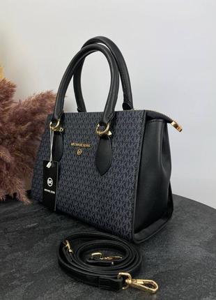 Стильная женская сумка michael kors  темно синего цвета на плече, отлично подойдет под деловой стиль бренда корс9 фото