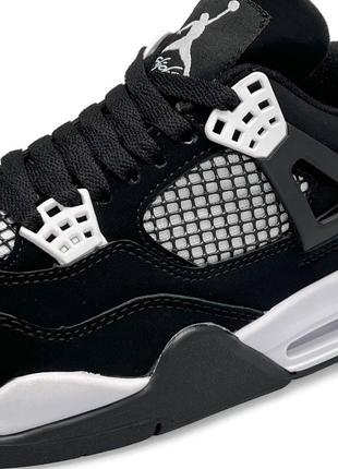 Женские кроссовки air jordan 4 retro black white thunder8 фото