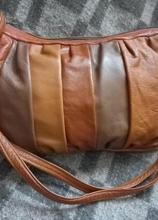Шкіряна сумка.