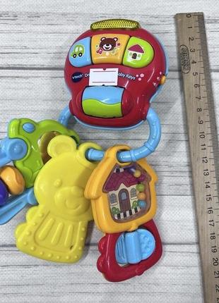 Музыкальный брелок погремушка vtech