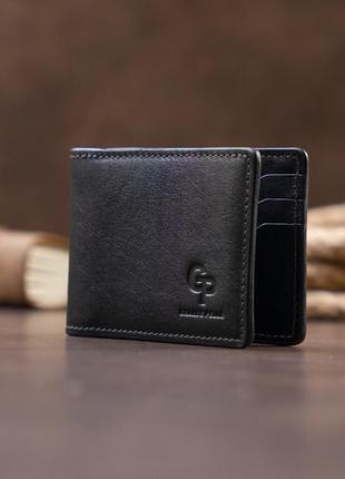 Стильное портмоне с зажимом для денег без застежки grande pelle 11295 черное6 фото