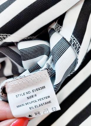 Жіночий піджак в чорно-білу смужку на гудзиках  від бренду eve3 фото