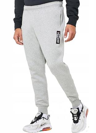 Штани nike nsw 'just do it' fleece jogger pants grey cj4778-0631 фото