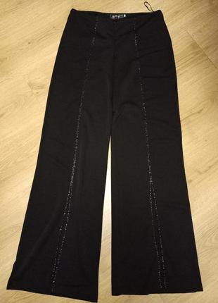 Стильные брюки брюки женские с разрезами и декором