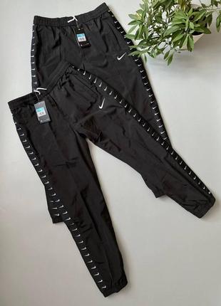 Штани nike на лампасах нейлонові