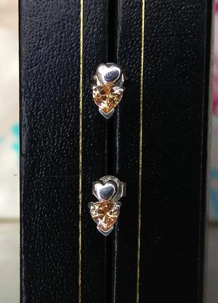 Серебряные женские серьги-гвоздики с фианитами1 фото