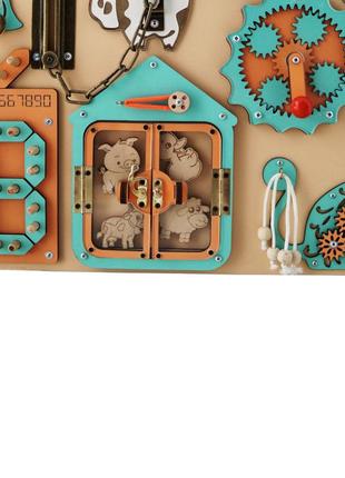 Развивающая игрушка бизиборд "пёс" tg1910773946, 50х40 см, оранжевый2 фото