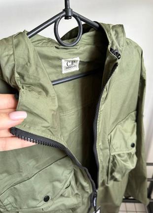 Легка куртка жіноча / чоловіча оливкова (зелена) з капюшоном c. p. company5 фото