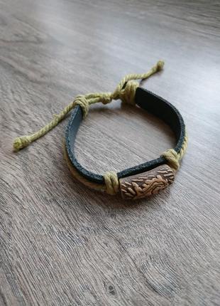 Кожаный браслет на затяжке с глиняным кулоном крокодил ящерица черный3 фото