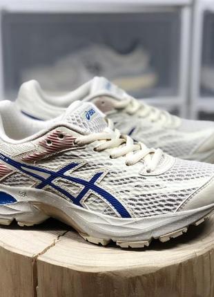 Жіночі кросівки asics