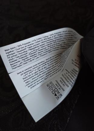 Красивая стильная черная юбка трапецией из жакарда9 фото