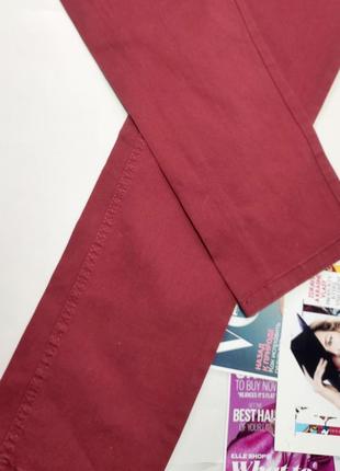 Джинсы женские бордового цвета со средней посадкой от бренда esmara 42/143 фото