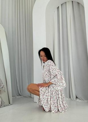 Жіноча елегантна оверсайз міні сукня з v-подібним коміром5 фото