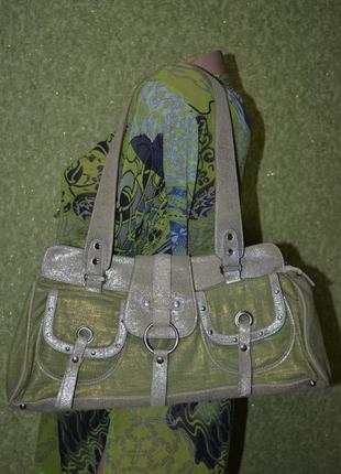 Стильная сумочка красивого нежно салатового цвета , материал кожа + текстиль с пропиткой