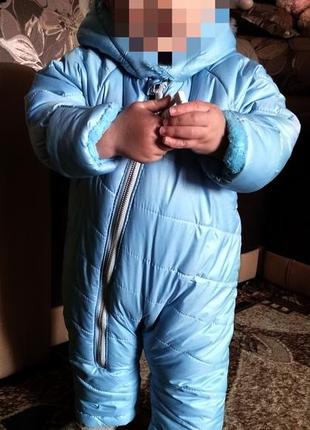 Суцільний демісезонний комбінезон.