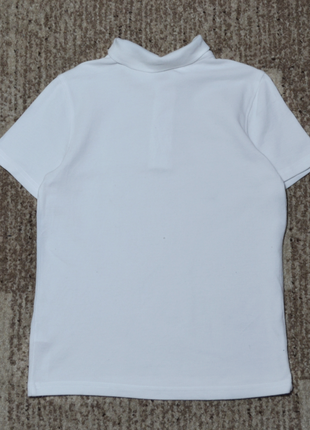 Біла футболка поло nutmeg на хлопчика 4-5 років9 фото