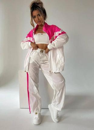 Жіночий спортивний костюм з плащової тканини штани на гумці та кофта на блискавці зипка вітровка весняний літній 42-525 фото