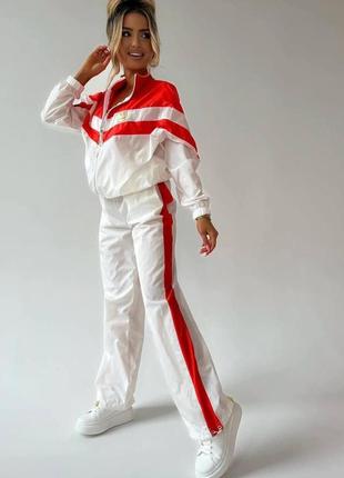 Жіночий спортивний костюм з плащової тканини штани на гумці та кофта на блискавці зипка вітровка весняний літній 42-524 фото